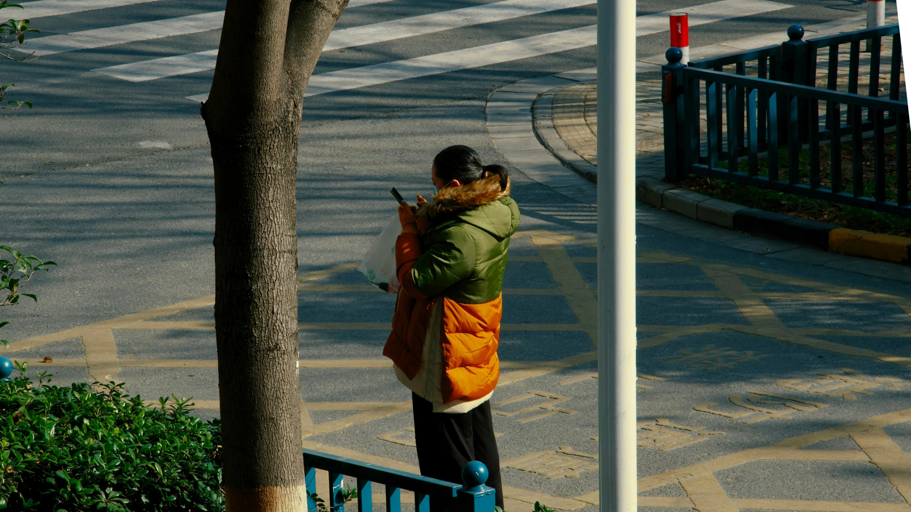 Person browsing products on a phone in a retail store, mobile commerce and the embedded shopping experience